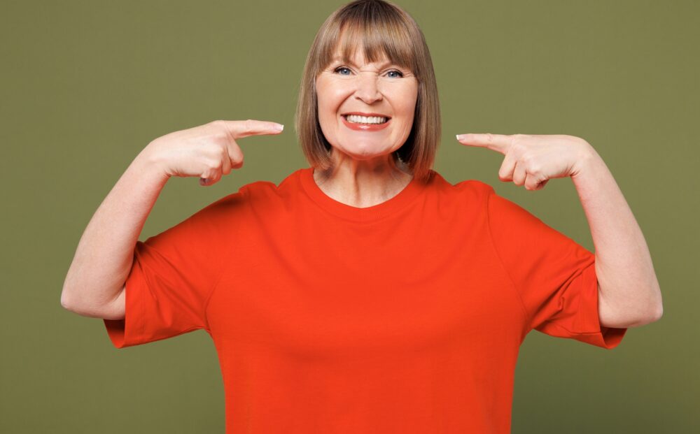 Elderly,Smiling,Blonde,Woman,50s,Years,Old,Wear,Orange,T-shirt