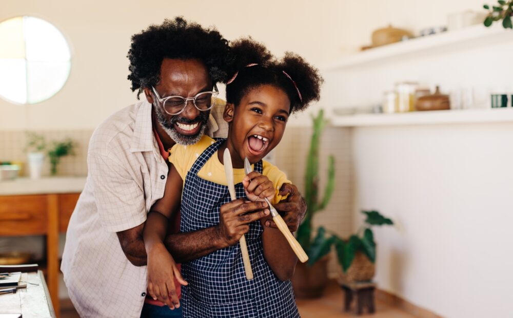 Cheerful,Black,Family,In,The,Kitchen.,Father,And,Daughter,Sing