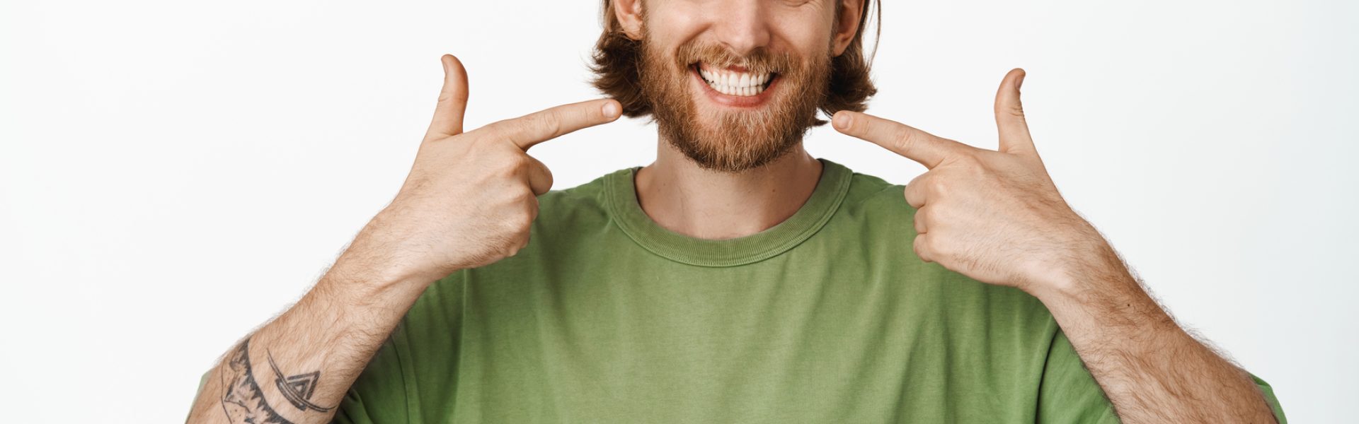 Stomatology,,Dental,Clinic.,Smiling,Handsome,Blond,Guy,,Caucasian,Man,Pointing